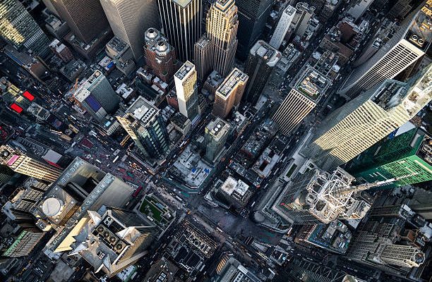 Designs That Influenced The World Helicopter point of view of Times Square in New York with many details visible in the image.