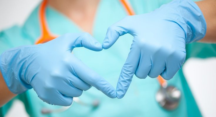 Doctor make heart shape